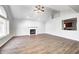 Spacious living room featuring a fireplace and laminate flooring at 1607 Wilford Ln, Indianapolis, IN 46229