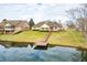 Lakefront house with steps to a private dock at 1832 Lakeside Ln, Indianapolis, IN 46229