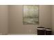 Simple laundry room with two hampers and a calming nature-themed painting at 19795 Boulder Brook Ln, Westfield, IN 46074