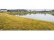 View of a pond with houses reflecting in the water at 19983 Chatham Green Dr, Westfield, IN 46074