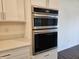 Built-in double oven and microwave in a modern kitchen at 2374 Riviera Pl, Greenwood, IN 46143