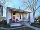 Front view of the charming house with a porch at 31 W South St, Shelbyville, IN 46176