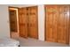 Bedroom with wood doors and closets at 3287 Melbourne S Rd, Indianapolis, IN 46228