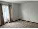 Bright bedroom with neutral carpeting and window at 501 Dorchester Dr, Noblesville, IN 46062