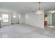 Open living room with a view into the kitchen and dining area at 5537 Kerns Ln, Indianapolis, IN 46268