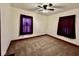 Well-lit bedroom with two windows and dark curtains at 640 S Sycamore St, Martinsville, IN 46151