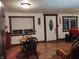 Small dining area with wooden table and chairs near the entryway at 8041 S Peoga Rd, Trafalgar, IN 46181