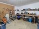 Well-equipped workshop with pegboard and workbenches at 8041 S Peoga Rd, Trafalgar, IN 46181