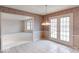 Dining area with view of living room and backyard access at 910 Sleepy Hollow Pl, Greenwood, IN 46142