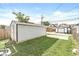 Large backyard with detached garage and shed at 305 Parkway Ave, Indianapolis, IN 46225