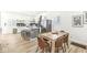 Modern kitchen with white cabinets, a large island, and stainless steel appliances at 305 Parkway Ave, Indianapolis, IN 46225