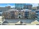 Multi-unit brick building in the city, with rooftop details at 355 E Ohio E St # 324, Indianapolis, IN 46204