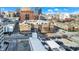 Aerial view of a brick building in a city setting, with downtown skyline in the background at 355 E Ohio E St # 324, Indianapolis, IN 46204