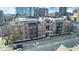 Multi-unit brick building, aerial view showcasing city backdrop at 355 E Ohio E St # 324, Indianapolis, IN 46204