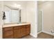 Modern bathroom with shower and wood vanity at 355 E Ohio E St # 324, Indianapolis, IN 46204