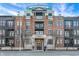 Brick building exterior, featuring multiple balconies and a grand entrance at 355 E Ohio E St # 324, Indianapolis, IN 46204