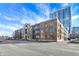 Modern brick building with city skyline in the background at 355 E Ohio E St # 324, Indianapolis, IN 46204