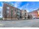 Building exterior showcasing brick facade and city street view at 355 E Ohio E St # 324, Indianapolis, IN 46204