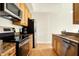 Bright kitchen, featuring stainless steel appliances and light wood cabinets at 355 E Ohio E St # 324, Indianapolis, IN 46204