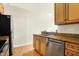 Modern kitchen with stainless steel appliances and granite countertops at 355 E Ohio E St # 324, Indianapolis, IN 46204