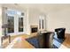 Living room with hardwood floors, fireplace and access to balcony at 355 E Ohio E St # 324, Indianapolis, IN 46204