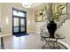 Elegant lobby with ornate staircase, large vase, and modern lighting at 355 E Ohio E St # 324, Indianapolis, IN 46204