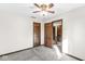 Spacious bedroom with two doors and carpet at 409 Lansdowne Rd, Indianapolis, IN 46234