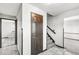 Hallway with staircase, tile floor and door to closet at 409 Lansdowne Rd, Indianapolis, IN 46234