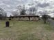 Backyard view of house and deck at 6612 Beech Dr, Indianapolis, IN 46214