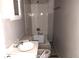 Bathroom with shower/tub combo, sink, and toilet at 604 Lincoln St, Indianapolis, IN 46203