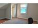 Small attic bedroom with closet and window at 604 Lincoln St, Indianapolis, IN 46203
