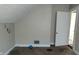 Small attic bedroom with closet and window at 604 Lincoln St, Indianapolis, IN 46203