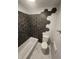 Bathroom with hexagon tile and marble floor at 6805 E County Road 100 S, Avon, IN 46123