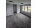 Spacious bedroom featuring new carpet and updated doors at 6805 E County Road 100 S, Avon, IN 46123