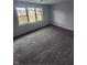 Bright bedroom with large window and ceiling fan at 6805 E County Road 100 S, Avon, IN 46123