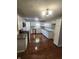 Kitchen with white cabinets, granite counters, and stainless steel appliances at 6805 E County Road 100 S, Avon, IN 46123