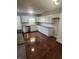 Kitchen with white cabinets, granite counters, and stainless steel appliances at 6805 E County Road 100 S, Avon, IN 46123