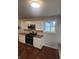 Kitchen with white cabinets, granite counters, and stainless steel appliances at 6805 E County Road 100 S, Avon, IN 46123