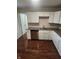 Kitchen with white cabinets, granite counters, and stainless steel appliances at 6805 E County Road 100 S, Avon, IN 46123