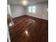 Bright and airy living room with hardwood floors and neutral walls at 6805 E County Road 100 S, Avon, IN 46123
