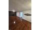 Spacious living room with hardwood floors and a fireplace at 6805 E County Road 100 S, Avon, IN 46123