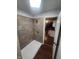 Updated shower with tile surround and new fixtures at 6805 E County Road 100 S, Avon, IN 46123