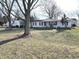 White ranch home with a large front yard at 985 Weber W Rd, Greenfield, IN 46140