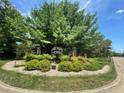 Community entrance with a sign that says The Oaks at Creekside at 2056 N Cobblestone Ct, Martinsville, IN 46151