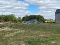 Vacant lot with new home construction in the background at 1366 Forest Hills Dr, Westfield, IN 46074