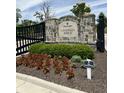 Chatham Ridge community entrance with stone pillars and black gate at 1366 Forest Hills Dr, Westfield, IN 46074