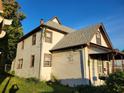 Side view of the two-story house at 2520 Winthrop Ave, Indianapolis, IN 46205