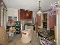 Living room with fireplace and various belongings at 11772 W Belle Union Rd, Stilesville, IN 46180