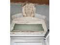 Close-up of ornate stone lintel above doorway at 11772 W Belle Union Rd, Stilesville, IN 46180