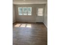 Living room with hardwood floors and sunlight at 4899 N 500 W, Bargersville, IN 46106